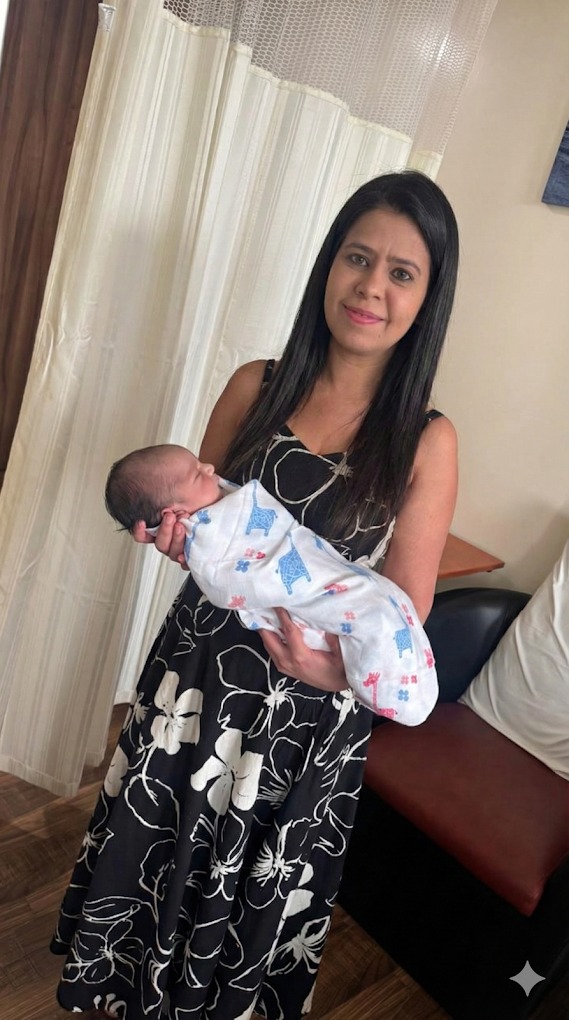 Dr. Payal holding a baby